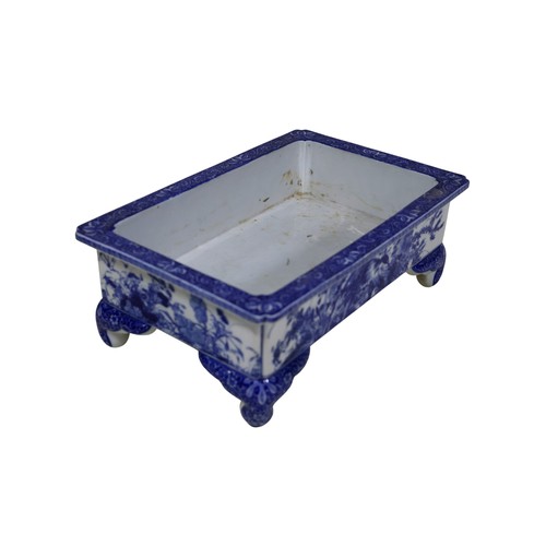 53 - An early 20th century Japanese blue and white rectangular jardinière, with floral banded detail, app... 