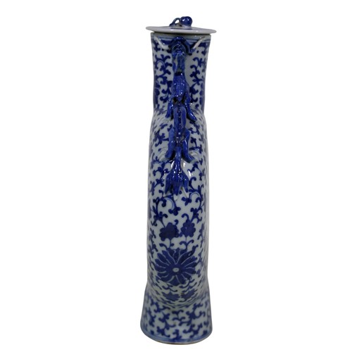 54 - A 19th century Chinese moon flask, with applied dragon mounts and floral detail, with associated cov... 