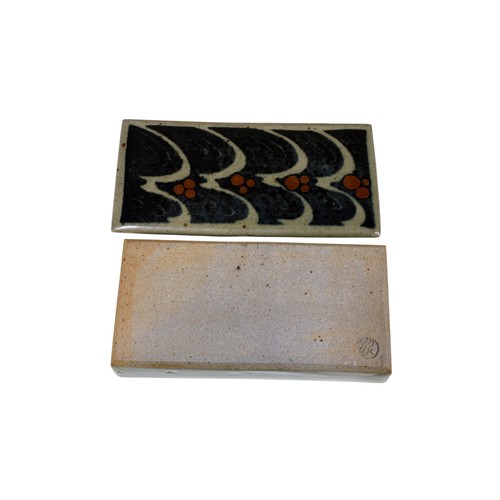 26 - A Winchcombe pottery teapot, ten stoneware glazed graduated plates, some marked for David Frith, tog... 