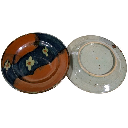 26 - A Winchcombe pottery teapot, ten stoneware glazed graduated plates, some marked for David Frith, tog... 