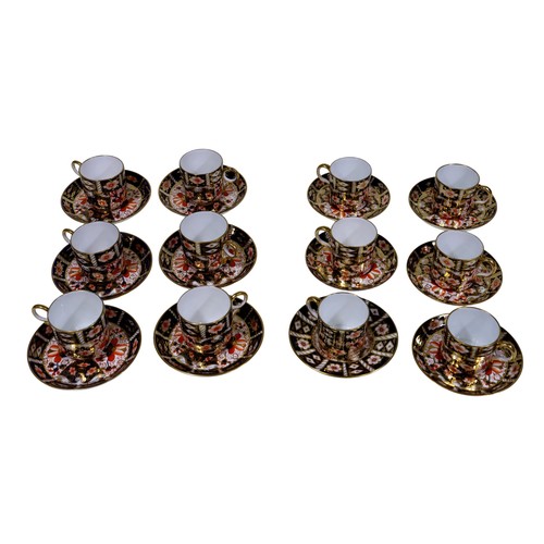 28 - A collection of Royal Crown Derby Imari pattern coffee cans and saucers, two shapes