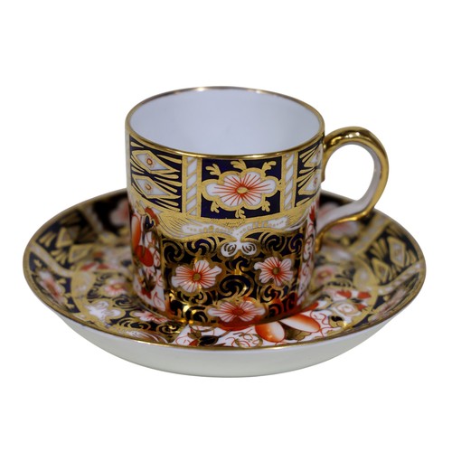 28 - A collection of Royal Crown Derby Imari pattern coffee cans and saucers, two shapes