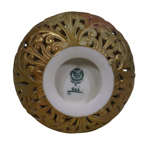 30 - A Grainger & Co. of Worcester reticulated decorative vase with scrolled handles, pierced scrolling b... 