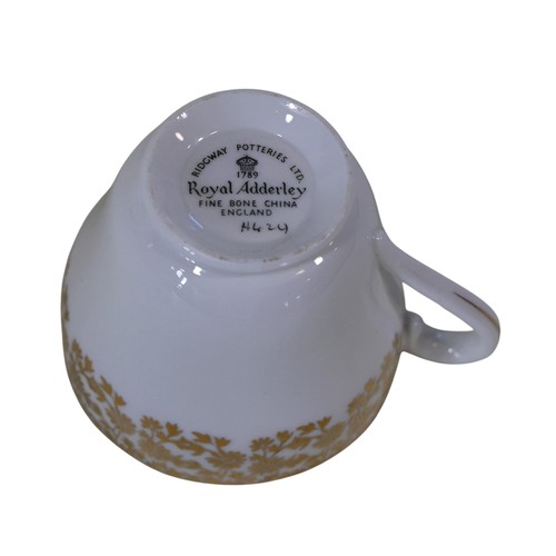 42 - Paragon Rockingham pattern tea service for six, and a further Royal Addley white and gilt coffee ser... 