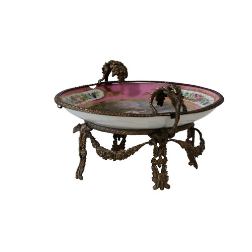 45 - A late 19th century French porcelain centre dish, with hand-painted floral bouquets, to the centre a... 
