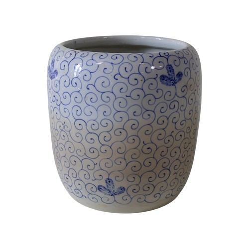 48 - Seven Chinese jardinières, in blue and white, celadon and other glazes, 29cm high maximum (7)
