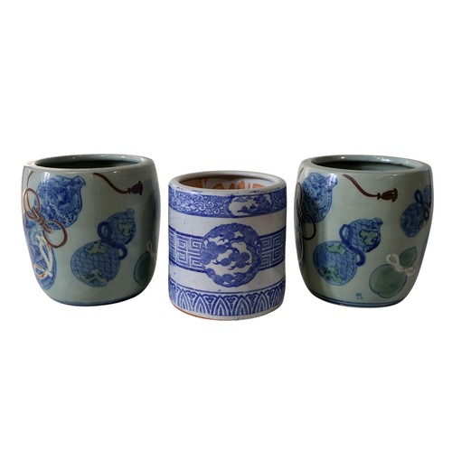 48 - Seven Chinese jardinières, in blue and white, celadon and other glazes, 29cm high maximum (7)