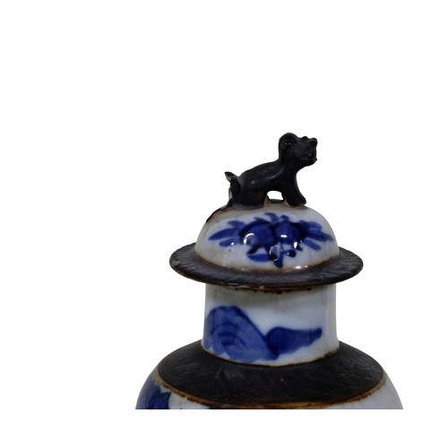 50 - A pair of Chinese crackle glaze inverted baluster shaped vases and covers, character and landscape d... 