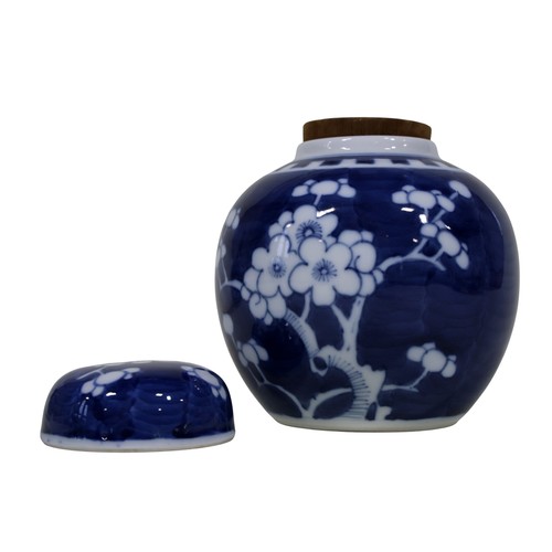 51 - A Chinese blue and white vase with drawn neck, with device panels, further prunus blossom ginger jar... 