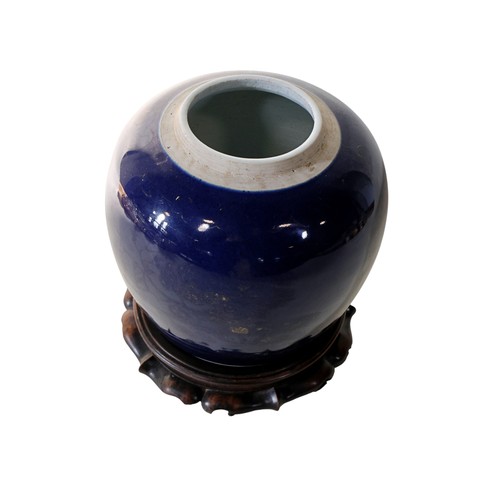 52 - A Chinese blue ground ginger jar, with traces of gilt showing phoenix and floral detail, 20cm