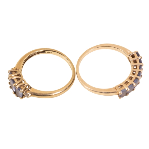 A 9ct yellow gold and tanzanite seven stone ring, size R, 2.5g together ...