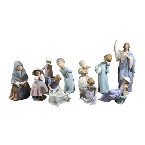 239 - A collection of 10 Nao Figures, mainly children