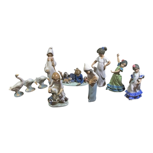 241 - A collection of 10 Lladro figures , principally children & Geese