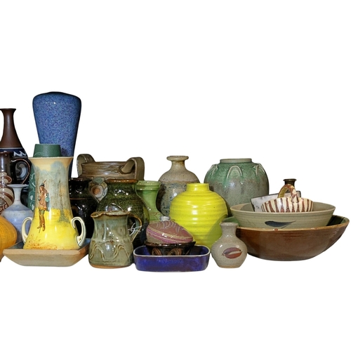 246 - A large collection of studio ware including vases, bowls, dishes etc (in excess of 60 pieces)