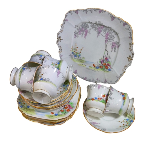 249 - A collection of mid 20th century Tea ware by Gladston & other factories together with a Shelley melo... 