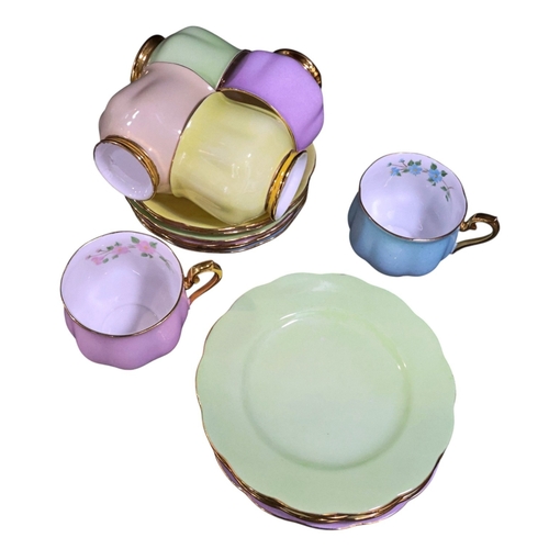 249 - A collection of mid 20th century Tea ware by Gladston & other factories together with a Shelley melo... 