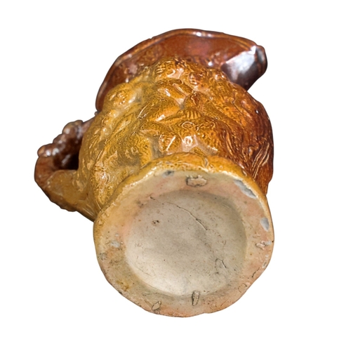 255 - A small 18th C Salt glazed Jug with Bacchanalian figures 8cm High