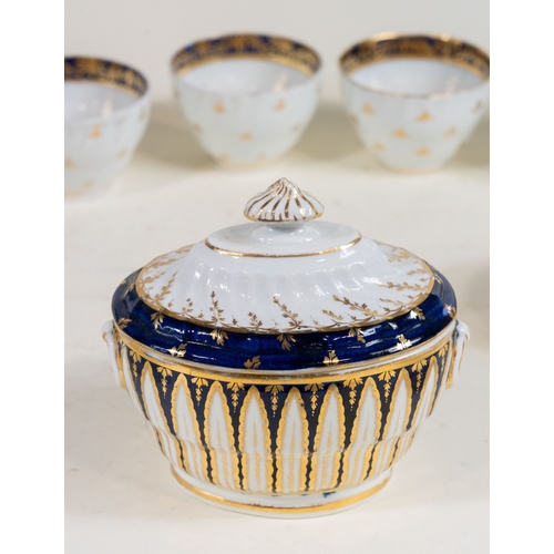 130 - A collection of 19th C Blue & Gilt tea bowls, tea cups, Sucrier etc