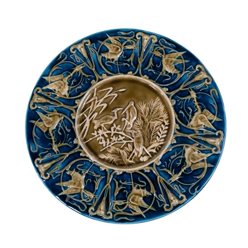 136 - A Austrian wall charger showing Herons, a pair of vases with Drawn necks, bulbous vase with floral d... 