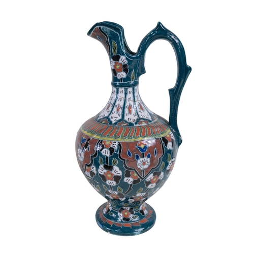136 - A Austrian wall charger showing Herons, a pair of vases with Drawn necks, bulbous vase with floral d... 