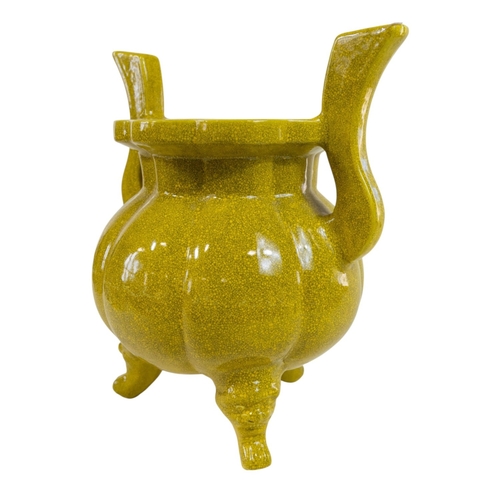 180 - A Chinese archaistic yellow crackle glazed censer on 3 moulded supports 38cm Height