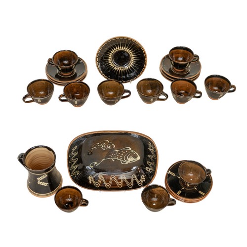 258 - A collection of Coldstone tea cups & saucers with Wheatear pattern, a slipware dish, terracotta figu... 