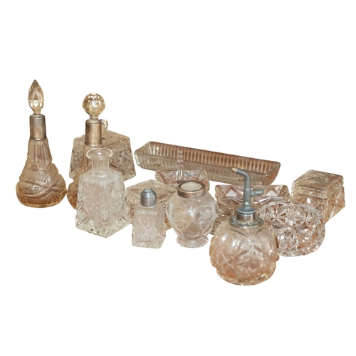 268 - A small collection of various cut glass, some silver mounted, to include scent bottles, atomiser, di... 
