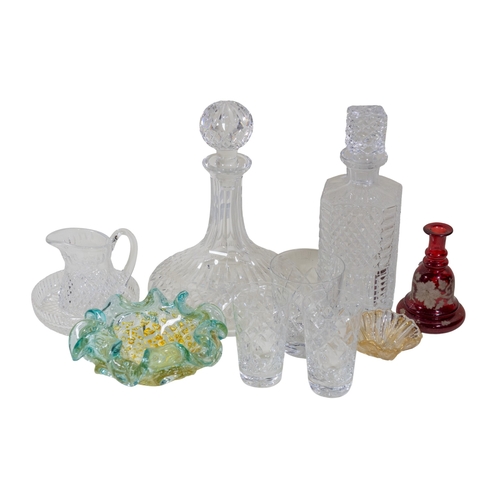 272 - A collection of mostly cut glass to include two ships decanters, a pair and another decanter, variou... 