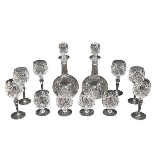 278 - A small group of contemporary cut glass to include a pair of decanters and stoppers, six wines and f... 