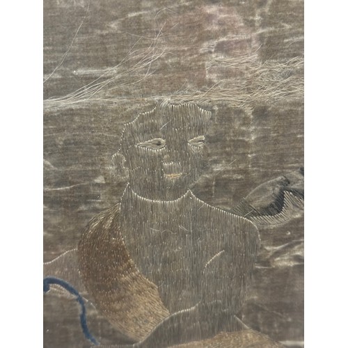 48 - Chinese School, 19th Century - Cupid carrying a bow and torch, silk embroidery, glazed in ebonised f... 