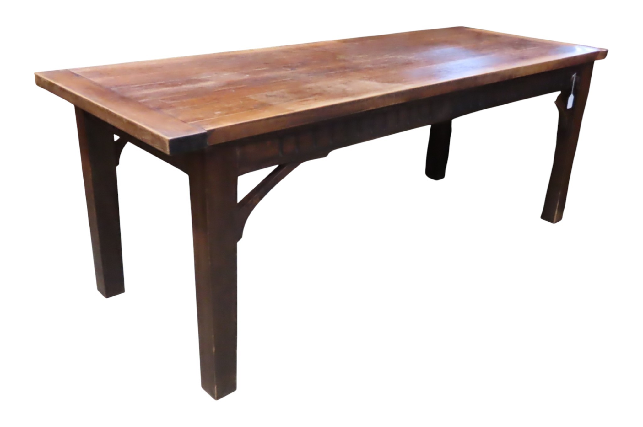 A pine refectory table with heavy plank top raised on square taper ...