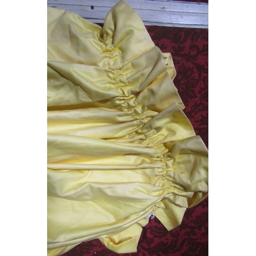 713 - A yellow ground curtain panel by Jon Rhodes with pinched pleat heading, fully lined, 200cm drop x 16... 