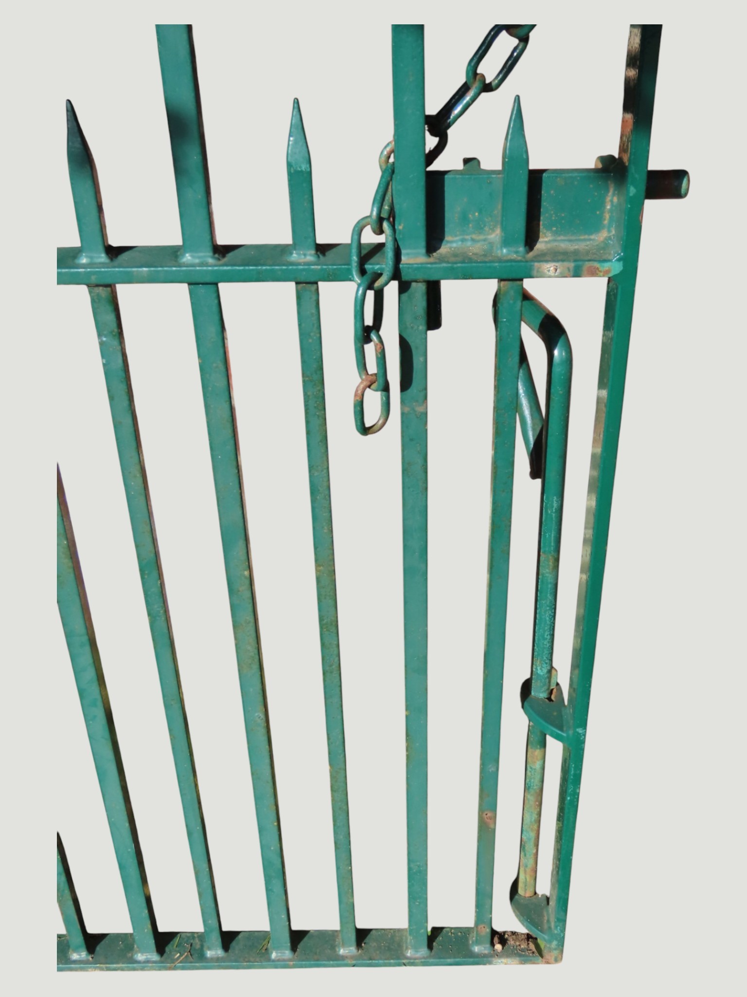 A pair of bespoke green painted heavy gauge iron gates with open square ...