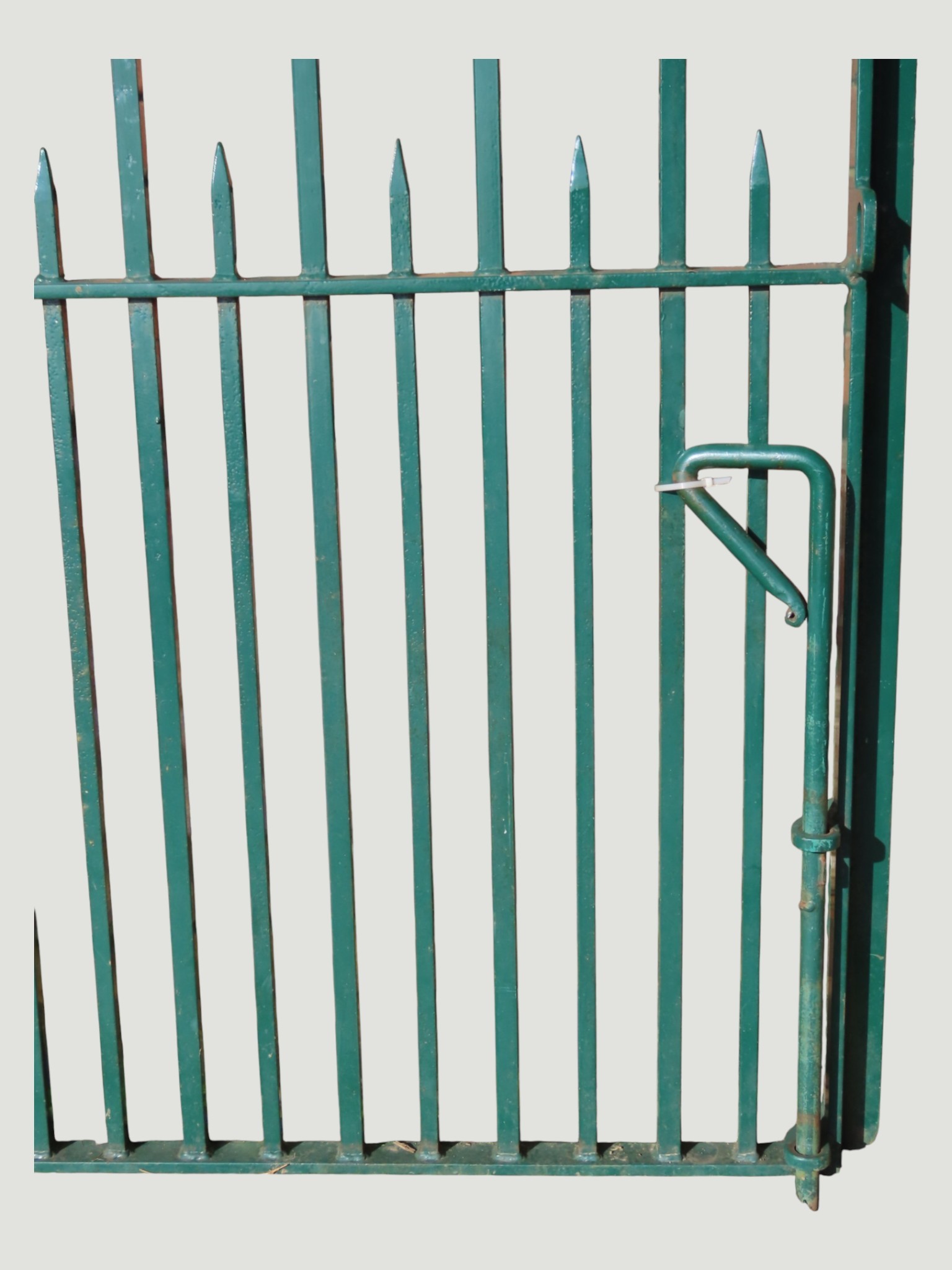 A pair of bespoke green painted heavy gauge iron gates with open square ...