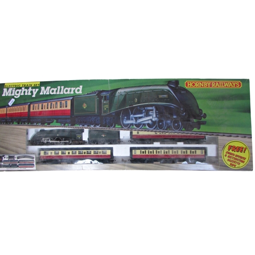 681 - Hornby Railways OO gauge Mighty Mallard with engine, tender, three coaches, mains power controller a... 