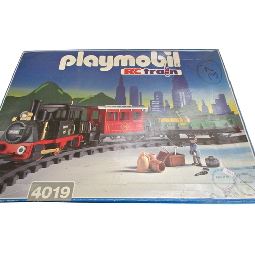 697 - Large quantity of Playmobil including R C Train boxes 4010, 4019, 4385 x 2 and further loose pieces