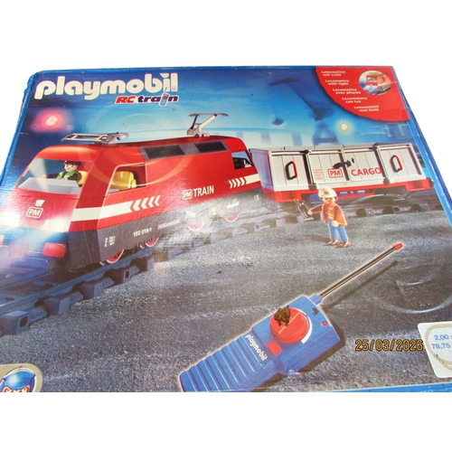 697 - Large quantity of Playmobil including R C Train boxes 4010, 4019, 4385 x 2 and further loose pieces