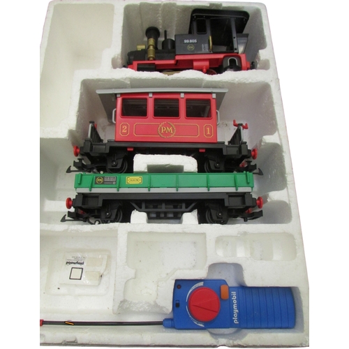 697 - Large quantity of Playmobil including R C Train boxes 4010, 4019, 4385 x 2 and further loose pieces