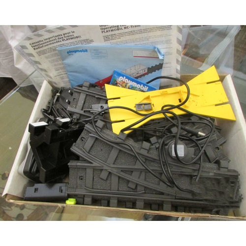 697 - Large quantity of Playmobil including R C Train boxes 4010, 4019, 4385 x 2 and further loose pieces