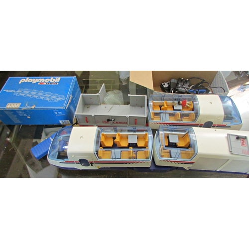 697 - Large quantity of Playmobil including R C Train boxes 4010, 4019, 4385 x 2 and further loose pieces