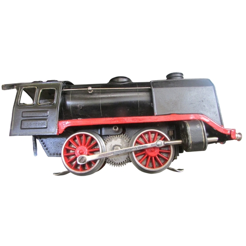 706 - A good collection of pre and post war German toy train effects by Marklin & Bing including two elect... 