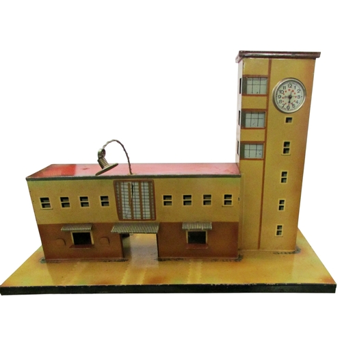 706 - A good collection of pre and post war German toy train effects by Marklin & Bing including two elect... 