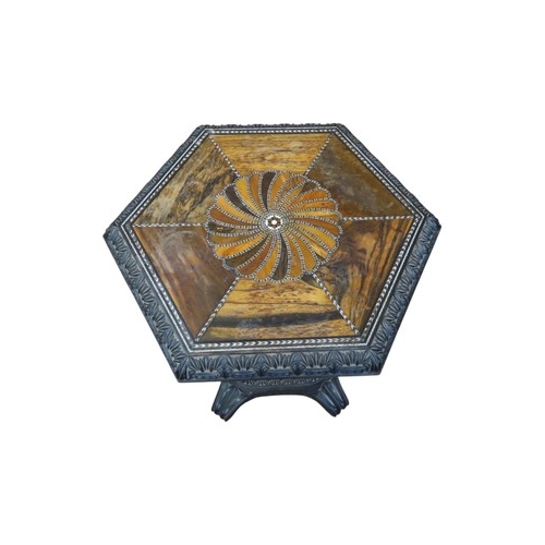 1523 - A good quality 19th Century ebony Celanese centre table. The hexagonal top with inlaid detail raised... 