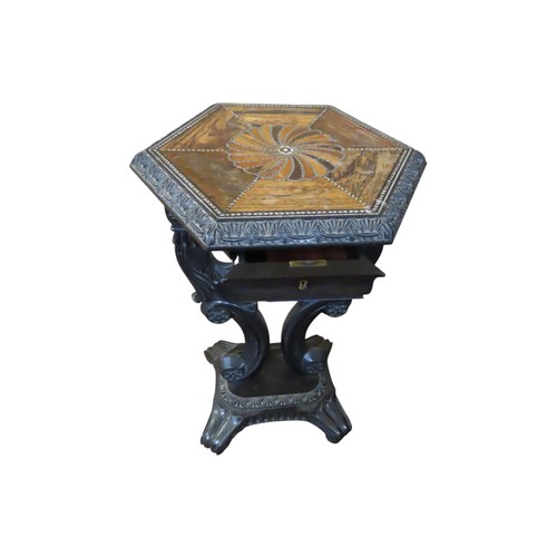 1523 - A good quality 19th Century ebony Celanese centre table. The hexagonal top with inlaid detail raised... 