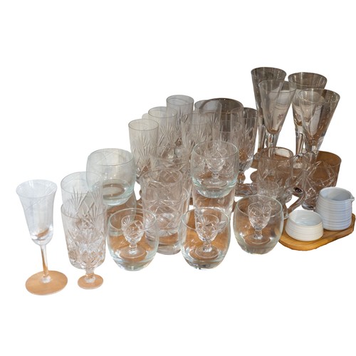 267 - A collection of clear and cut glasses to include wines, tumblers, etc.