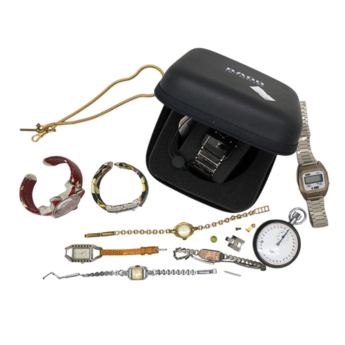 675 - A collection of various watches to include a Tag Heuer stop watch and various wristwatches, Armani, ... 