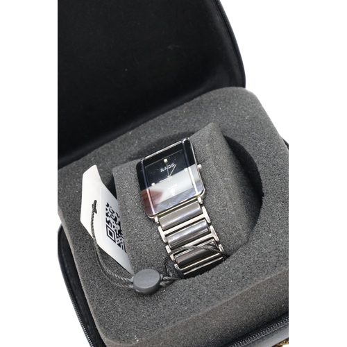 675 - A collection of various watches to include a Tag Heuer stop watch and various wristwatches, Armani, ... 