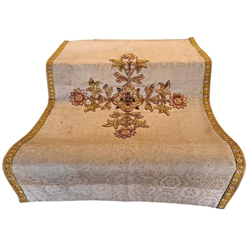 710A - Religious interest; an early 20th century needlework and gold brocade embroidered alter panel with f... 