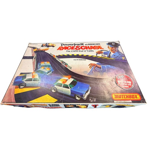 692 - Matchbox power track, race and chase set with two cars and 5.5 metres of track boxed