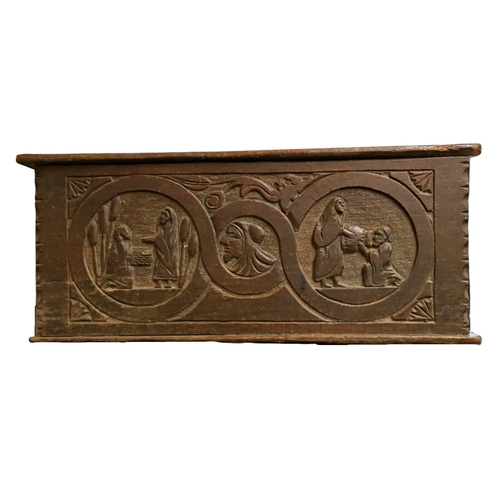 1524 - An early oak coffer carved with Biblical scenes of Moses, Abraham, Ruth etc 35cm H X 80cm L X 40cm D